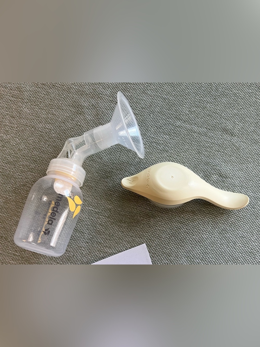 Medela Handheld Breast Pump in Yellow and Clear